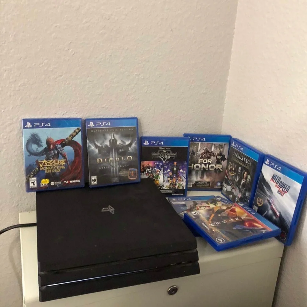 PS4 PlayStation 4 Pro CUH-7115B 1TB + 9 Games + Power Cord Bundle